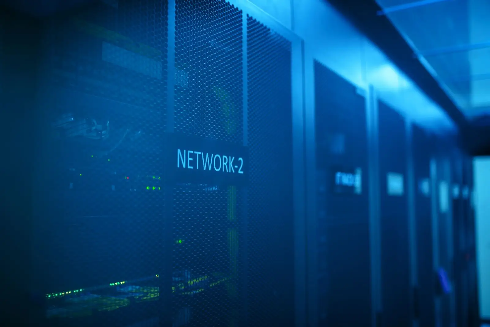 Blue-lit network racks in a data centre